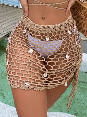 Estilo elegante feminino artesanal crochê oco lado cordão bikini cover-ups praia outing férias oco para fora saia concha